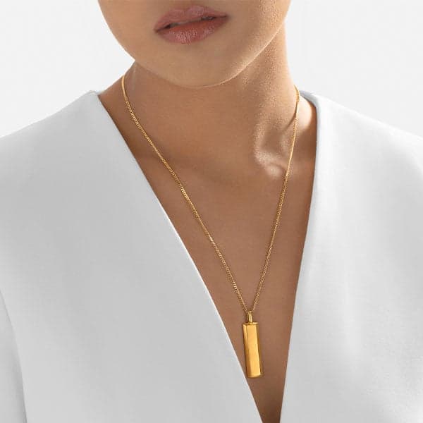https://www.moneymetals.com/images/products/15-5grams-gold-pendant-matte-bar-ladies.jpg