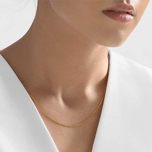 https://www.moneymetals.com/images/products/4grams-1-3mm-flat-gold-chain-curb-female-model.jpg