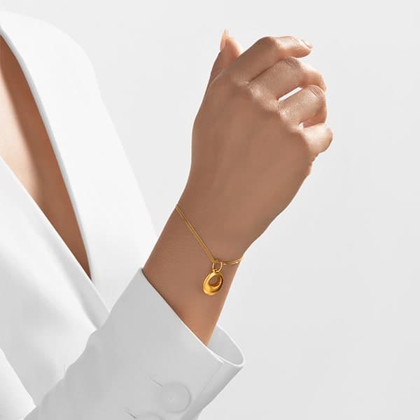 https://www.moneymetals.com/images/products/7.9grams-gold-charm-edged-ball-model.jpg