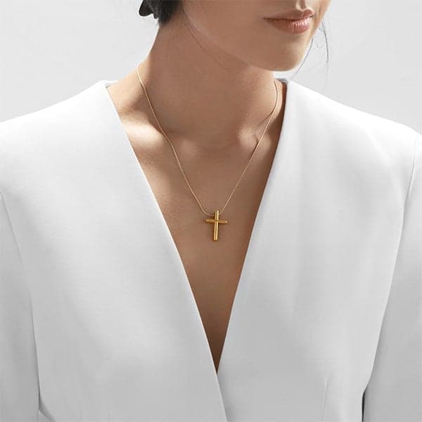 https://www.moneymetals.com/images/products/9.9grams-gold-pendant-slender-cross-ladies-model.jpg